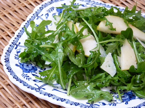 arugula pear parmesan salad close